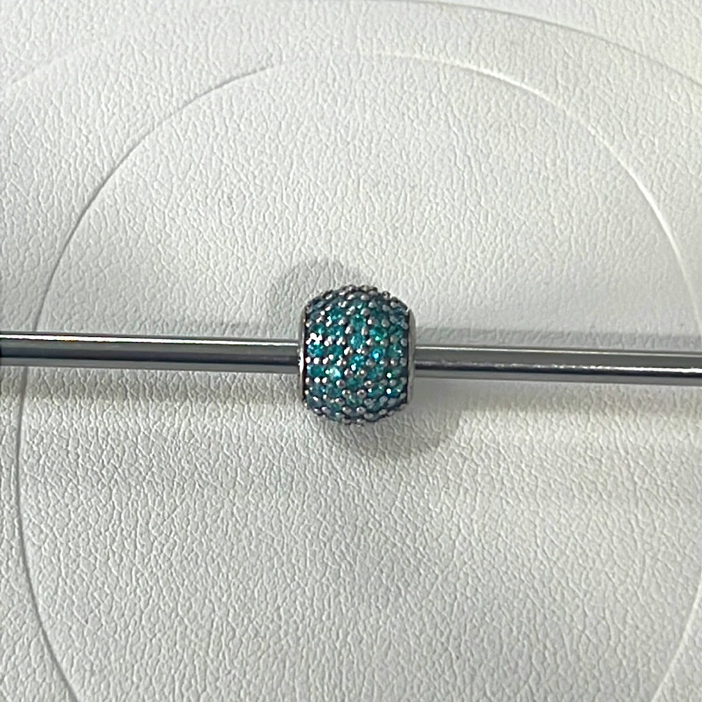 Retired Pandora teal CZ charm